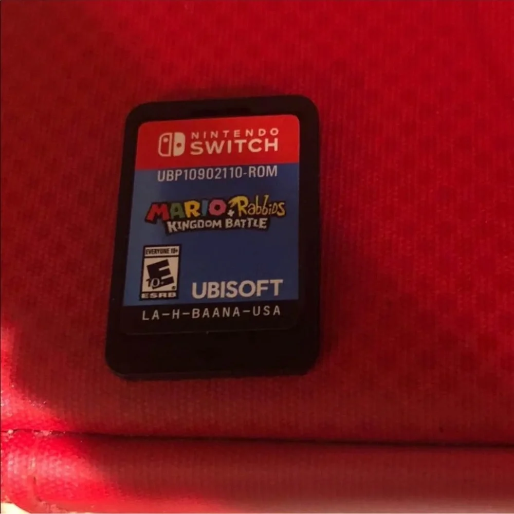 Nintendo Switch Console with Red and Black Controllers